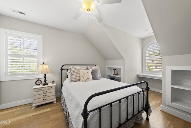 175 Stonecrest Way, Pittsboro, NC 27312 - bedroom featuring wood finished floors, lofted ceiling, and a ceiling fan