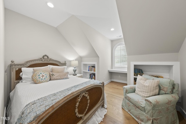 175 Stonecrest Way, Pittsboro, NC 27312 - bedroom with wood finished floors, vaulted ceiling, and recessed lighting