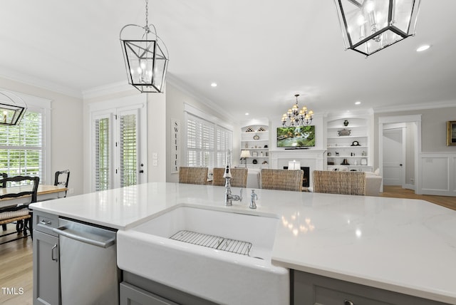 175 Stonecrest Way, Pittsboro, NC 27312 - kitchen with a chandelier, dishwasher, open floor plan, gray cabinetry, and crown molding