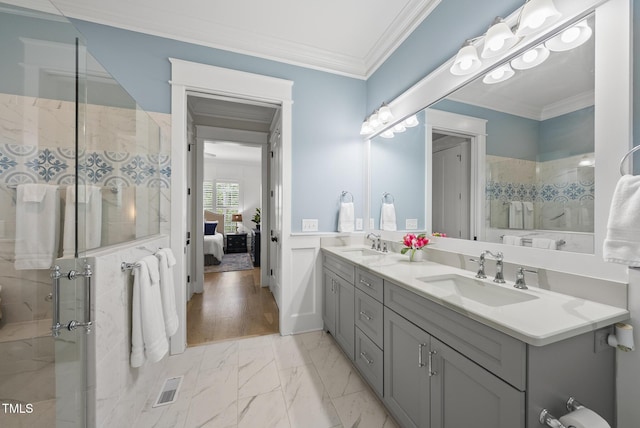 175 Stonecrest Way, Pittsboro, NC 27312 - ensuite bathroom with double vanity, tiled shower, marble look tile flooring, and crown molding