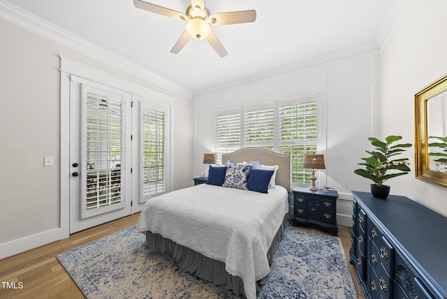 175 Stonecrest Way, Pittsboro, NC 27312 - bedroom featuring access to exterior, crown molding, wood finished floors, and a ceiling fan