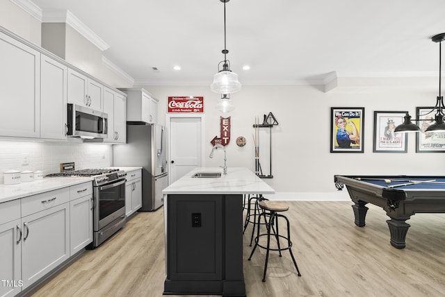175 Stonecrest Way, Pittsboro, NC 27312 - kitchen with appliances with stainless steel finishes, light wood-style floors, ornamental molding, recessed lighting, and decorative backsplash