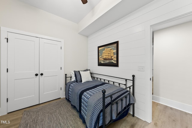175 Stonecrest Way, Pittsboro, NC 27312 - bedroom with light wood-style flooring, a closet, and a ceiling fan