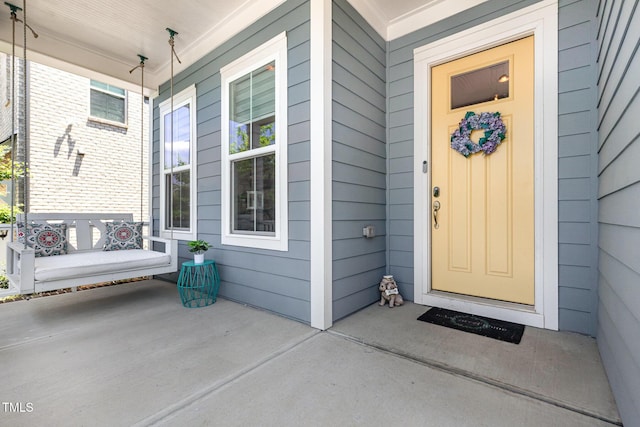 664 Old Dairy Dr, Wake Forest, NC 27587 - entrance to property with a porch