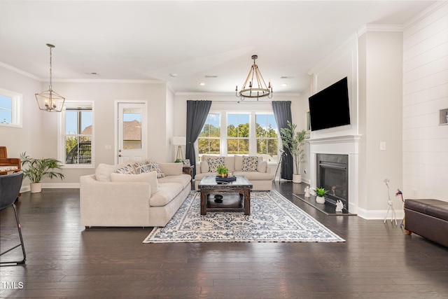 664 Old Dairy Dr, Wake Forest, NC 27587 - living area with a chandelier, plenty of natural light, hardwood / wood-style flooring, ornamental molding, and recessed lighting