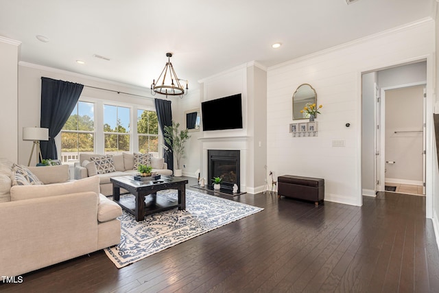 664 Old Dairy Dr, Wake Forest, NC 27587 - living area featuring dark wood-style floors, a fireplace with flush hearth, a chandelier, ornamental molding, and recessed lighting