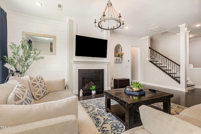 664 Old Dairy Dr, Wake Forest, NC 27587 - living room featuring wood finished floors, stairs, crown molding, recessed lighting, and a fireplace with flush hearth