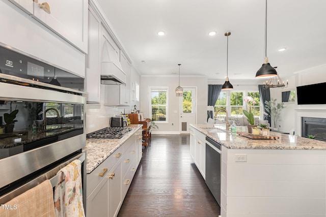 664 Old Dairy Dr, Wake Forest, NC 27587 - kitchen with dark wood-style flooring, stainless steel appliances, decorative backsplash, light stone counters, and recessed lighting