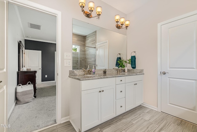 664 Old Dairy Dr, Wake Forest, NC 27587 - bathroom with a chandelier, double vanity, and a stall shower