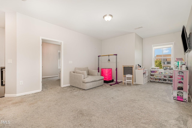 664 Old Dairy Dr, Wake Forest, NC 27587 - sitting room with carpet floors and baseboards
