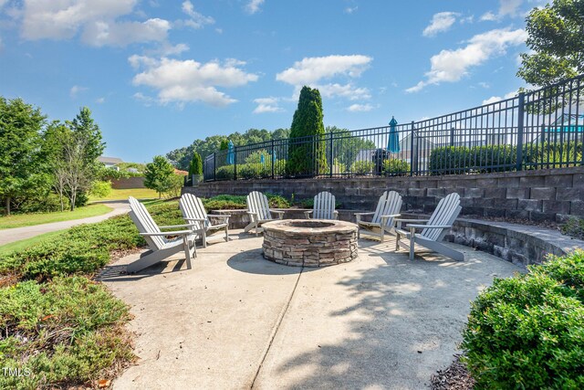 664 Old Dairy Dr, Wake Forest, NC 27587 - view of patio / terrace featuring a fire pit
