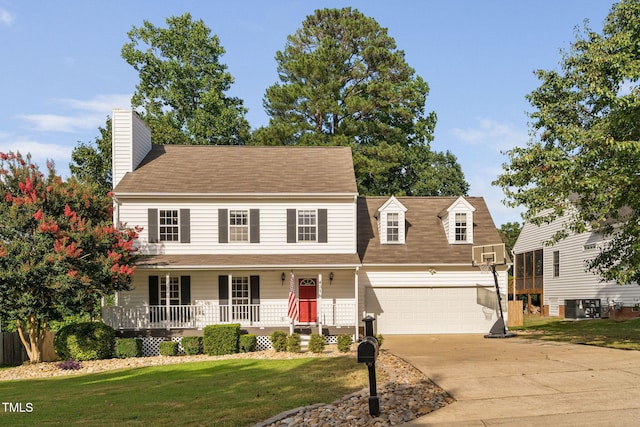 4316 Major Loring Way, Raleigh, NC 27616 - view of front of property with covered porch, driveway, a front yard, a chimney, and roof with shingles
