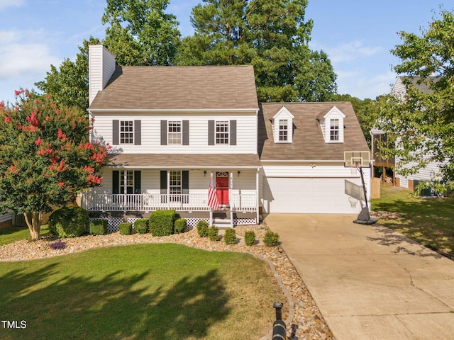 4316 Major Loring Way, Raleigh, NC 27616 - view of front facade with a porch, a front yard, driveway, and an attached garage
