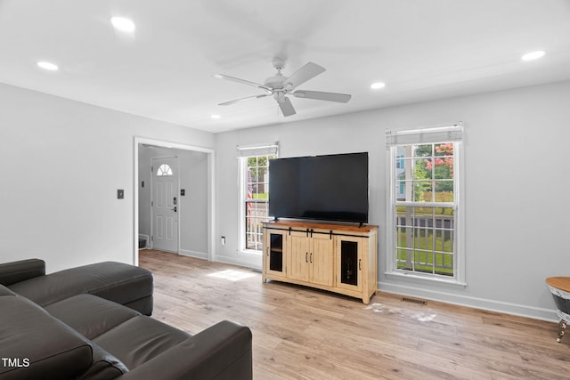 4316 Major Loring Way, Raleigh, NC 27616 - living room with plenty of natural light, light wood finished floors, recessed lighting, and a ceiling fan