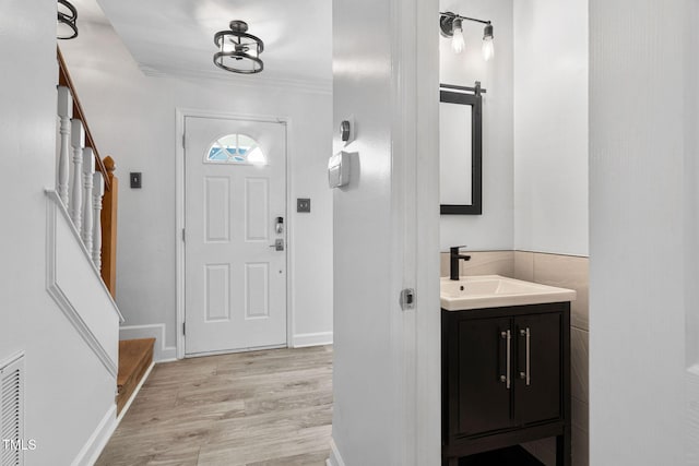 4316 Major Loring Way, Raleigh, NC 27616 - foyer entrance with light wood-style flooring and a barn door
