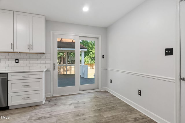 4316 Major Loring Way, Raleigh, NC 27616 - doorway to outside with light wood-style floors and baseboards