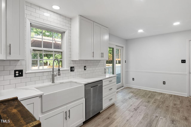 4316 Major Loring Way, Raleigh, NC 27616 - kitchen featuring dishwasher, healthy amount of natural light, light wood-style floors, light stone counters, and recessed lighting