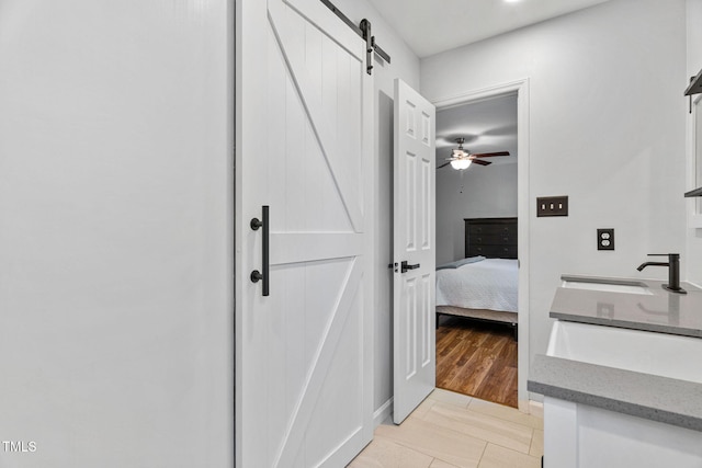 4316 Major Loring Way, Raleigh, NC 27616 - bathroom featuring vanity, tile patterned floors, connected bathroom, and ceiling fan