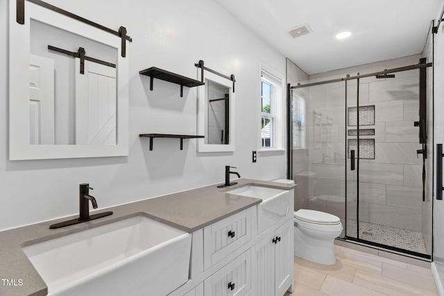 4316 Major Loring Way, Raleigh, NC 27616 - full bathroom featuring double vanity, a stall shower, and recessed lighting