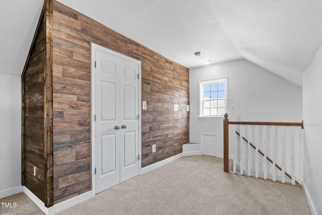 4316 Major Loring Way, Raleigh, NC 27616 - bonus room with lofted ceiling, carpet floors, and wood walls