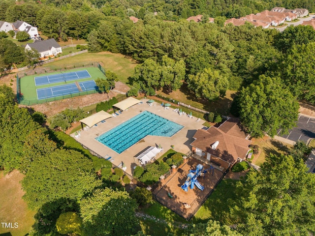 4316 Major Loring Way, Raleigh, NC 27616 - drone / aerial view of a pool and a heavily wooded area