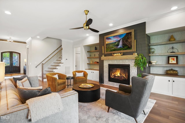 241 Teague St, Wake Forest, NC 27587 - living room with ornamental molding, stairway, wood finished floors, ceiling fan, and recessed lighting