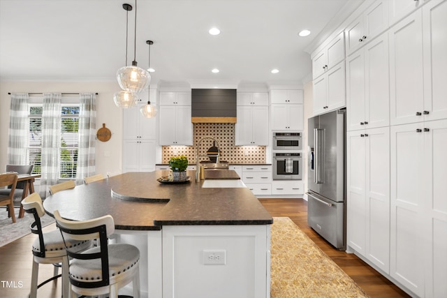 241 Teague St, Wake Forest, NC 27587 - kitchen with appliances with stainless steel finishes, custom range hood, white cabinetry, decorative backsplash, and dark wood-type flooring