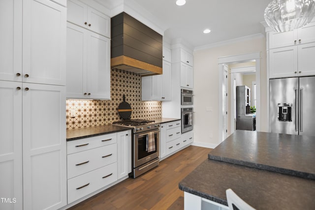 241 Teague St, Wake Forest, NC 27587 - kitchen featuring high end appliances, dark countertops, decorative backsplash, ornamental molding, and dark wood-style floors