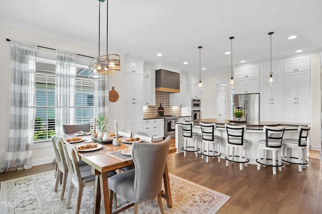 241 Teague St, Wake Forest, NC 27587 - dining space featuring wood finished floors and recessed lighting