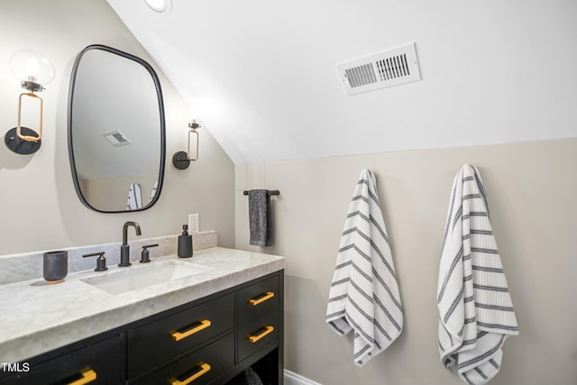 241 Teague St, Wake Forest, NC 27587 - bathroom featuring lofted ceiling and vanity