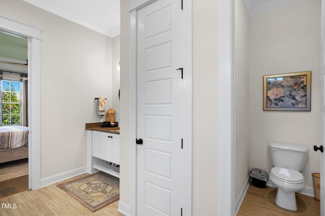 241 Teague St, Wake Forest, NC 27587 - bathroom with wood finished floors, vanity, and ensuite bath