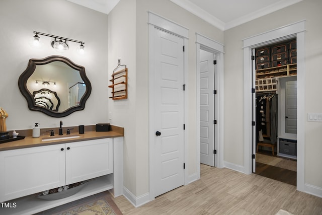 241 Teague St, Wake Forest, NC 27587 - bathroom with vanity, wood finished floors, and crown molding