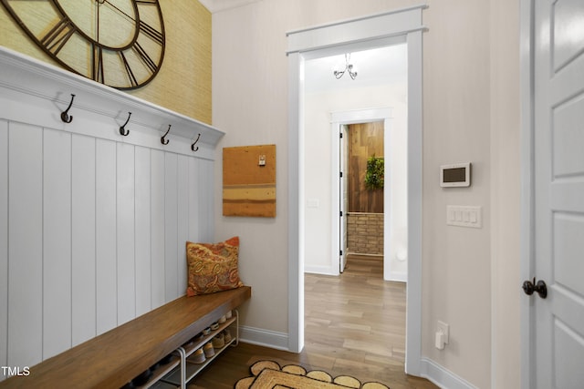 241 Teague St, Wake Forest, NC 27587 - mudroom with wood finished floors and a chandelier
