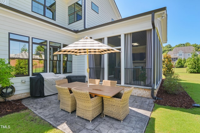241 Teague St, Wake Forest, NC 27587 - view of patio / terrace with grilling area, a sunroom, and outdoor dining area