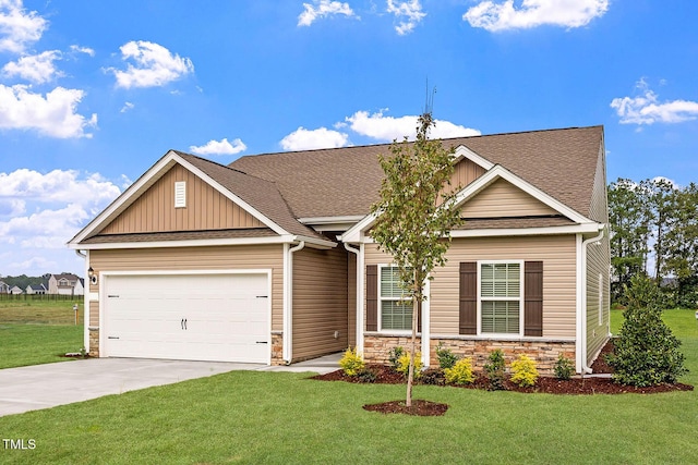 3837 Ava Dr, Bailey, NC 27807 - craftsman-style home with concrete driveway, stone siding, a garage, and a front lawn