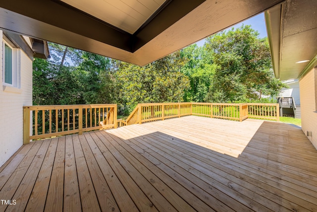 944 Athens Dr, Raleigh, NC 27606 - wooden deck featuring view of scattered trees