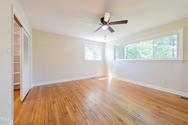 944 Athens Dr, Raleigh, NC 27606 - empty room featuring light wood-style floors and ceiling fan