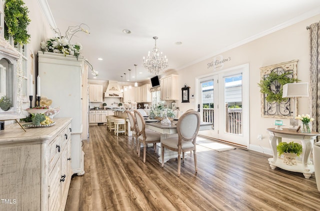 190 Mitchells Chapel Rd, Pittsboro, NC 27312 - dining room with ornamental molding, a chandelier, wood finished floors, and recessed lighting