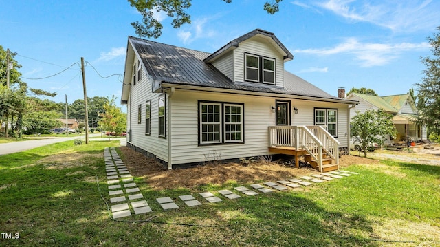 505 Hawfields Rd, Mebane, NC 27302 - rear view of property featuring a yard and a metal roof