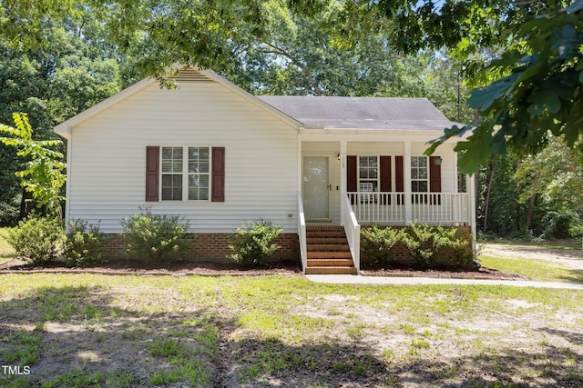 119 Percheron Dr, Zebulon, NC 27597 - view of front of house featuring a porch