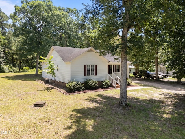119 Percheron Dr, Zebulon, NC 27597 - view of front of house featuring crawl space, a front yard, and roof with shingles