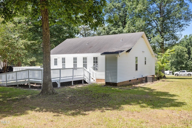 119 Percheron Dr, Zebulon, NC 27597 - rear view of property featuring crawl space, a yard, a shingled roof, and a wooden deck