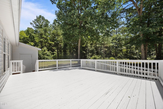 119 Percheron Dr, Zebulon, NC 27597 - wooden deck featuring view of wooded area