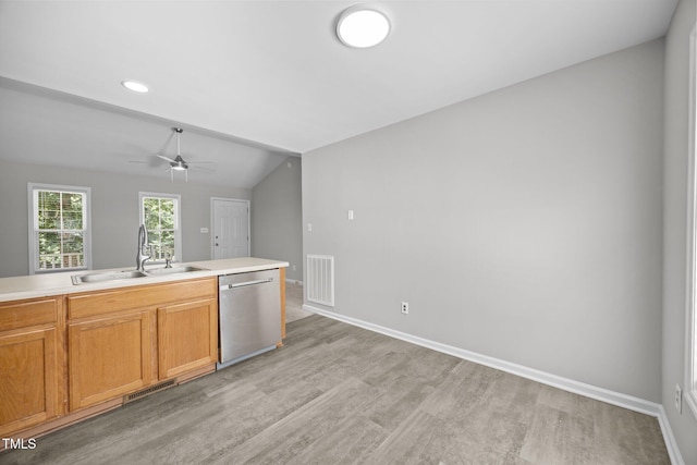 119 Percheron Dr, Zebulon, NC 27597 - kitchen featuring stainless steel dishwasher, light wood-style floors, lofted ceiling, a ceiling fan, and light countertops