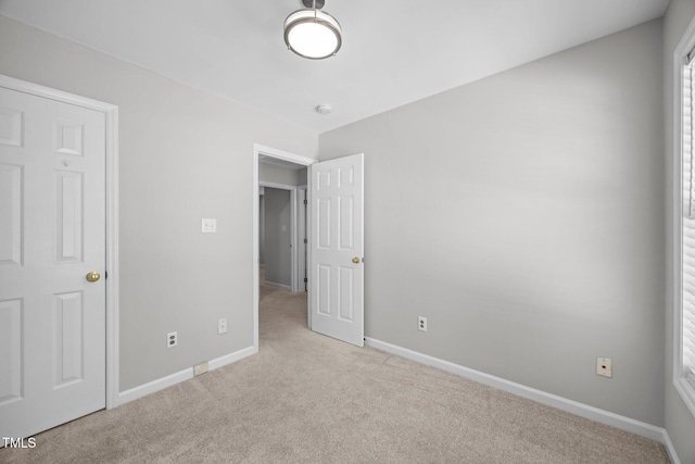 119 Percheron Dr, Zebulon, NC 27597 - unfurnished bedroom with carpet flooring and baseboards