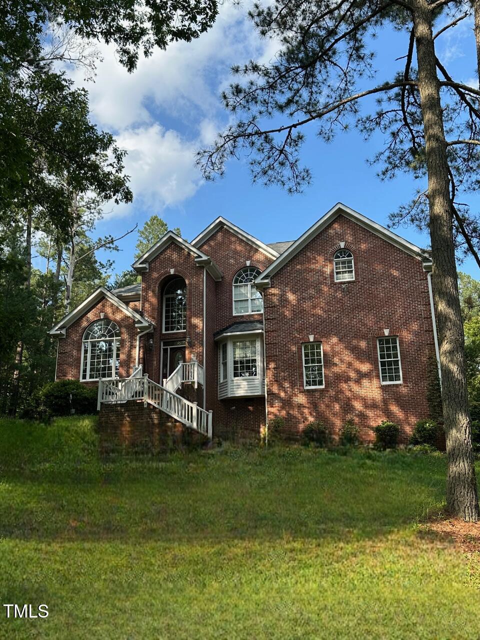 3689 Graham Sherron Rd, Wake Forest, NC 27587 - view of front of property featuring brick siding and a front yard