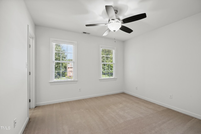 5940 Dahlberg Dr, Raleigh, NC 27603 - unfurnished room with light carpet and a ceiling fan