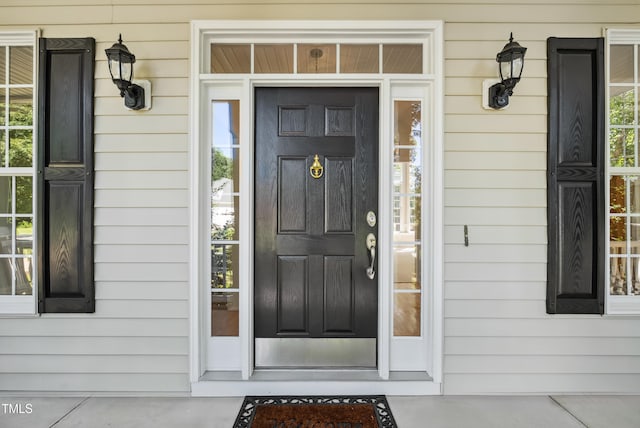 5940 Dahlberg Dr, Raleigh, NC 27603 - entrance to property with a porch