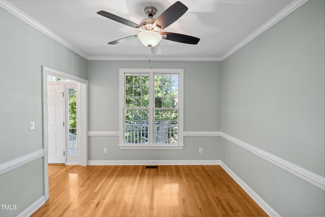 5940 Dahlberg Dr, Raleigh, NC 27603 - empty room featuring light wood-style flooring, ceiling fan, and ornamental molding