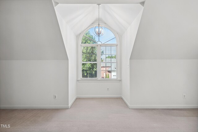 5940 Dahlberg Dr, Raleigh, NC 27603 - bonus room with lofted ceiling, a chandelier, and carpet floors